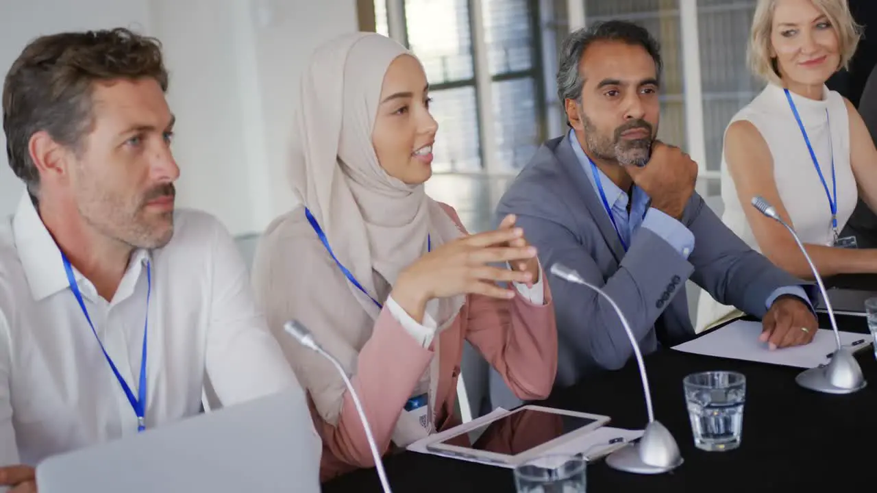 A panel of delegates at a business conference