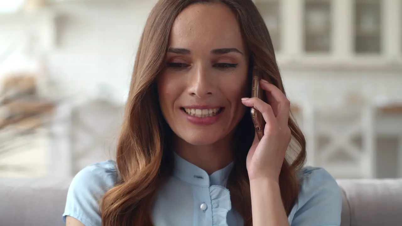 Smiling business woman speaking phone at home office Girl feeling happy