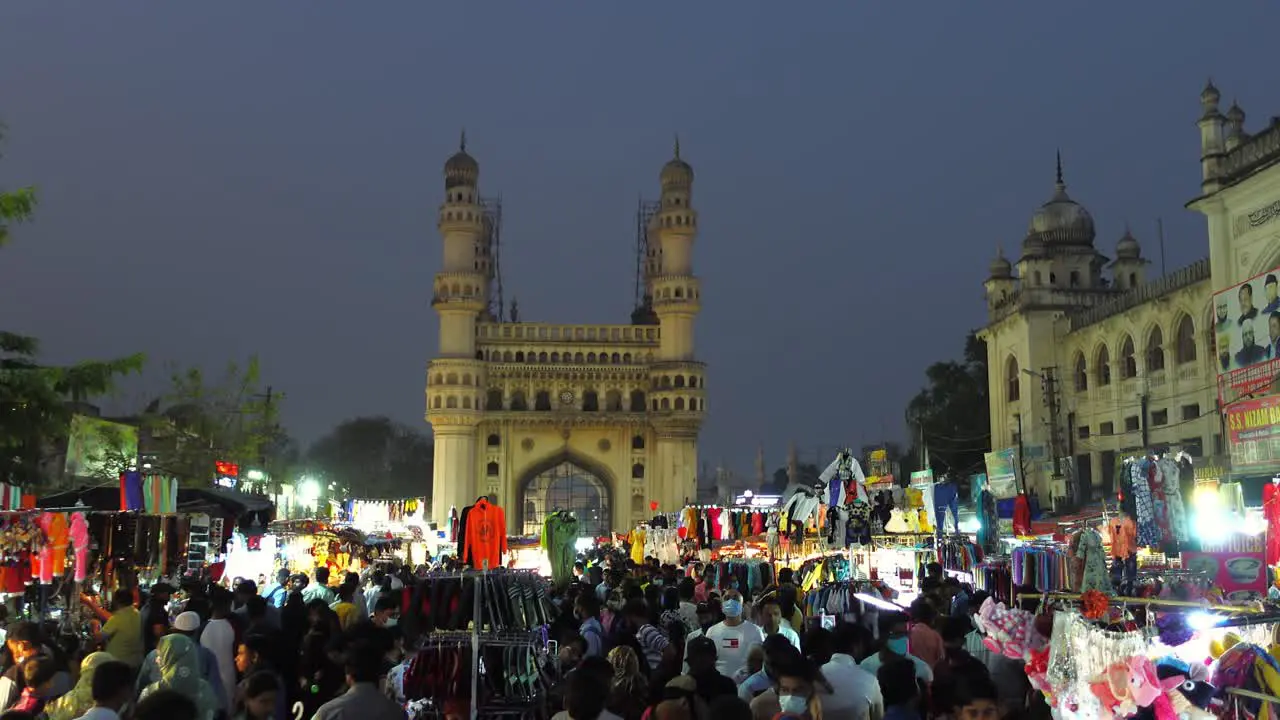 Crowded local market near famous monument Charminar at night