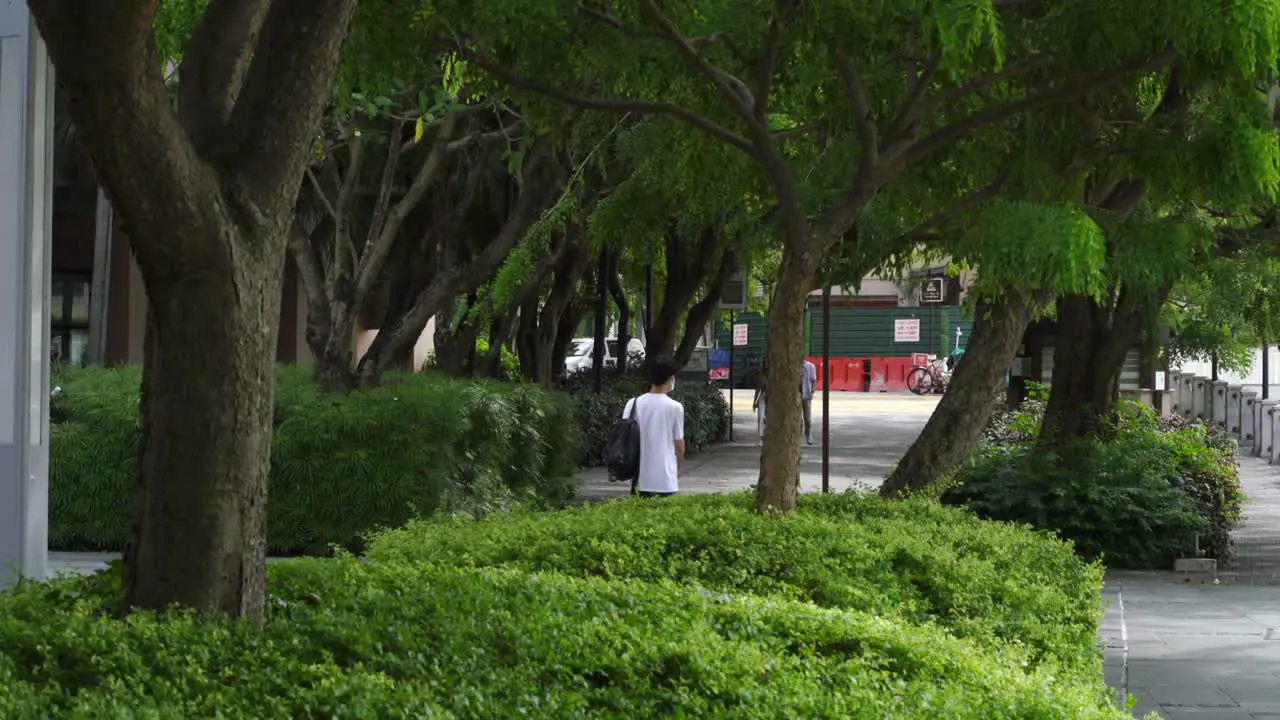 People walking in the afternoon at park by Clarke Quay in Singapore