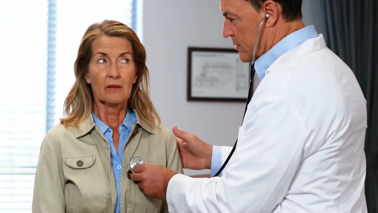 Doctor examining a senior woman