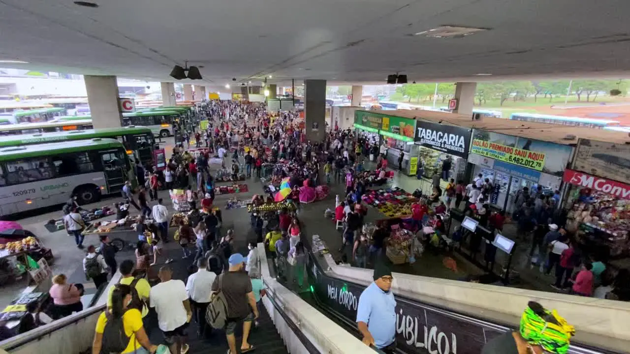 Busy crowded public bus terminal station during rush hour in Brasilia Brazil