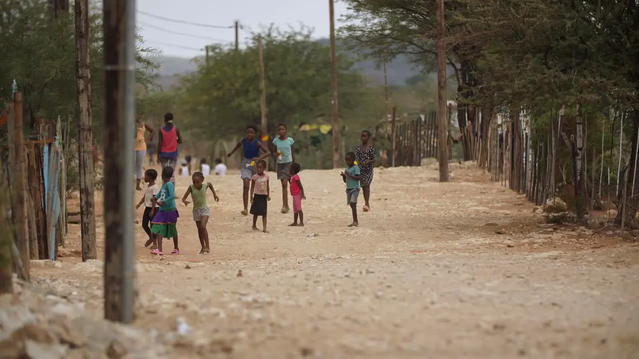 Children playing In A Small Street Village In Africa