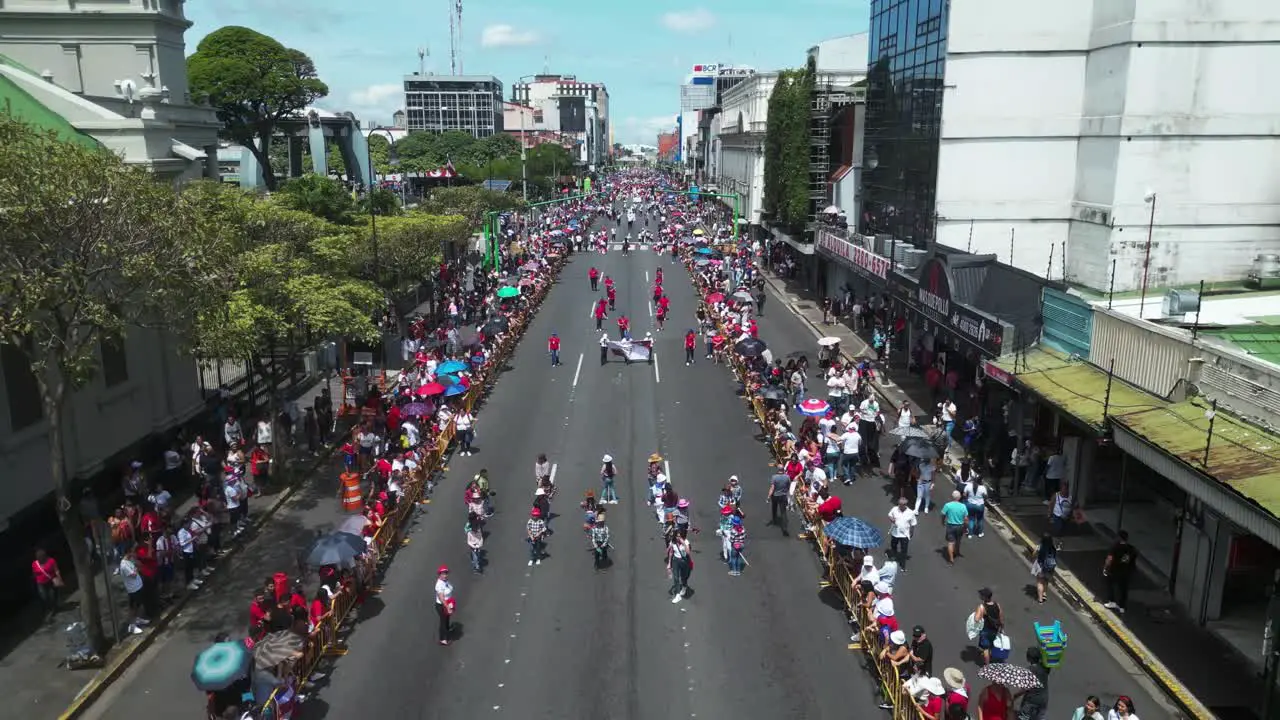 Drone Shot of Costa Rican Independance Day Parade Over School Children in Typical Clothing