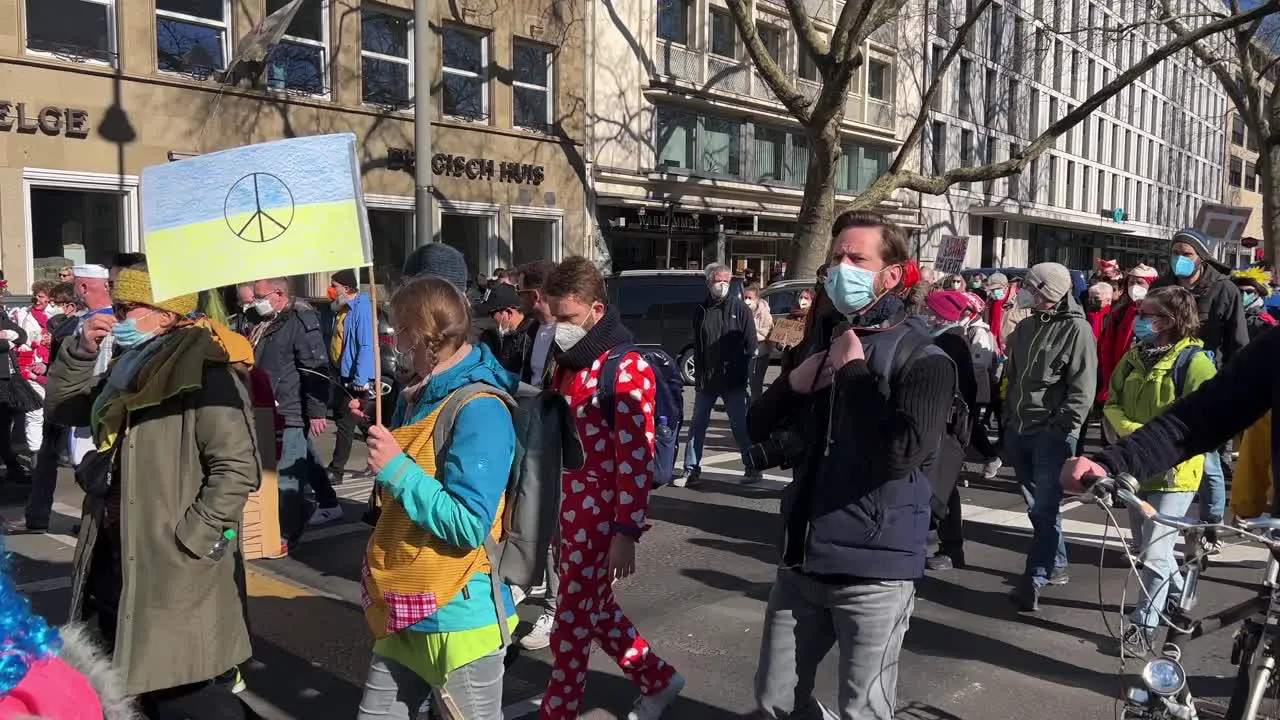 Peace walk and anti war protest during the carnival parades in Cologne Germany