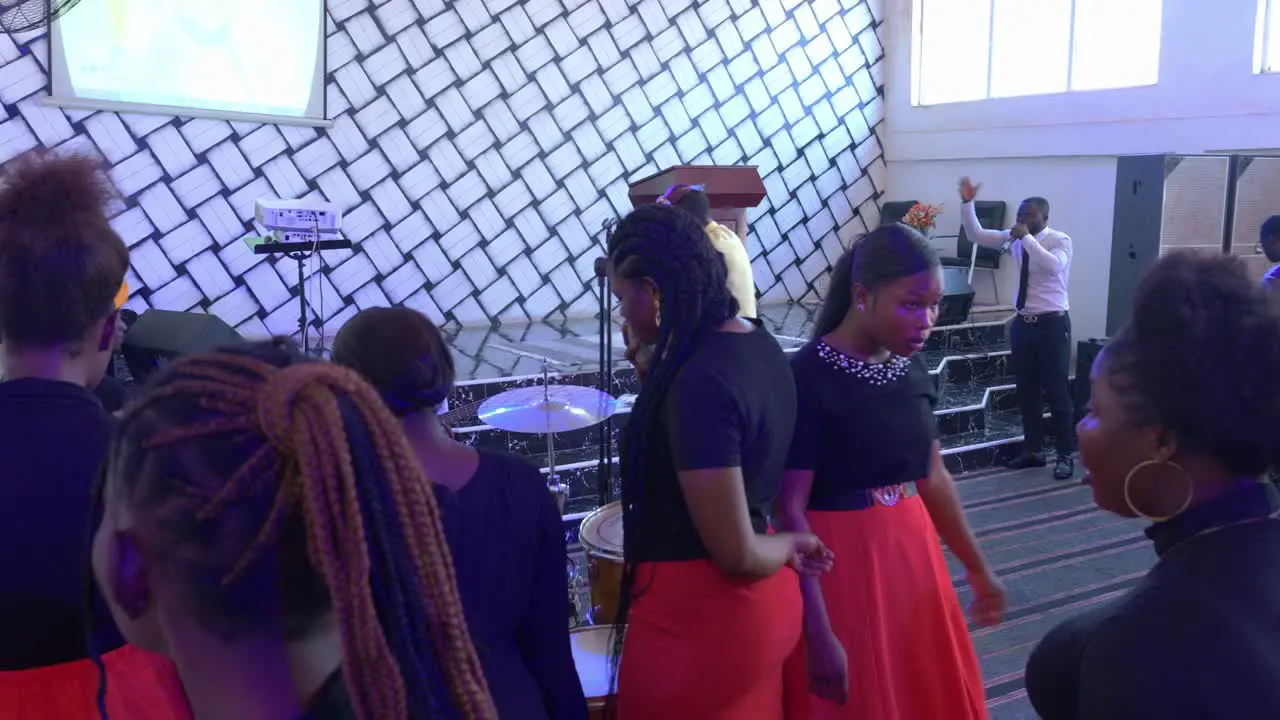 African people singing and rehearsing in Kumasi church