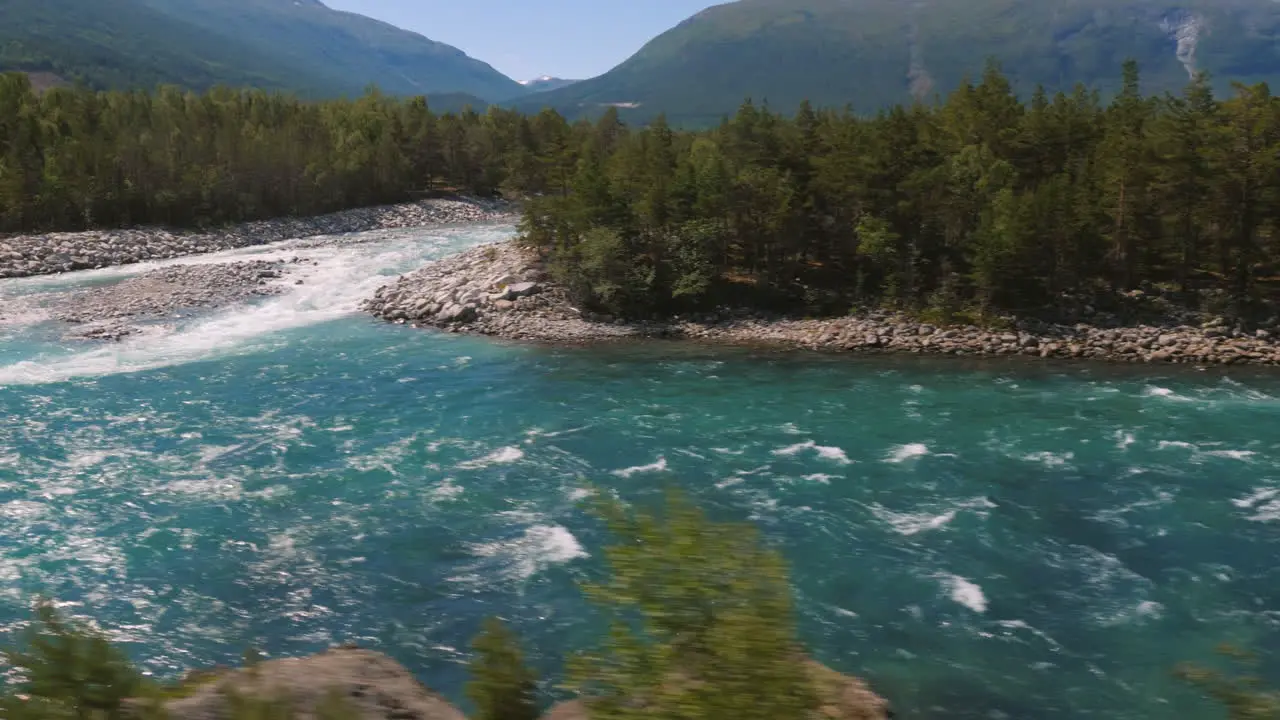 Ride Along A Beautiful Mountain River And Forest In Norway View From A Car Window