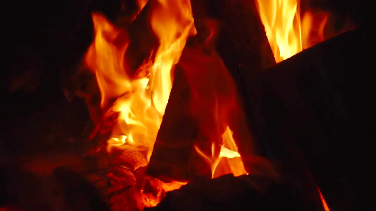 Slow motion clip of a camp fire at night