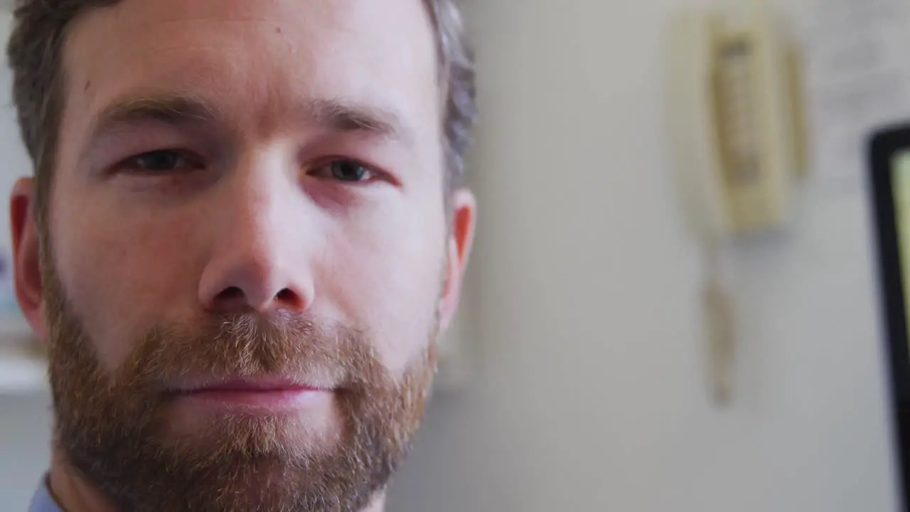 Doctor smiling at camera in a retirement home