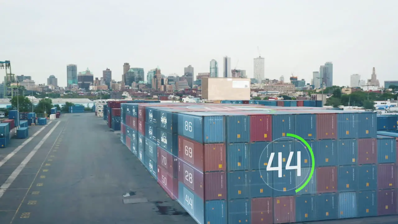 Augmented reality in logistics showing figures about stacked naval containers in cargo terminal High rise buildings in background New York City USA