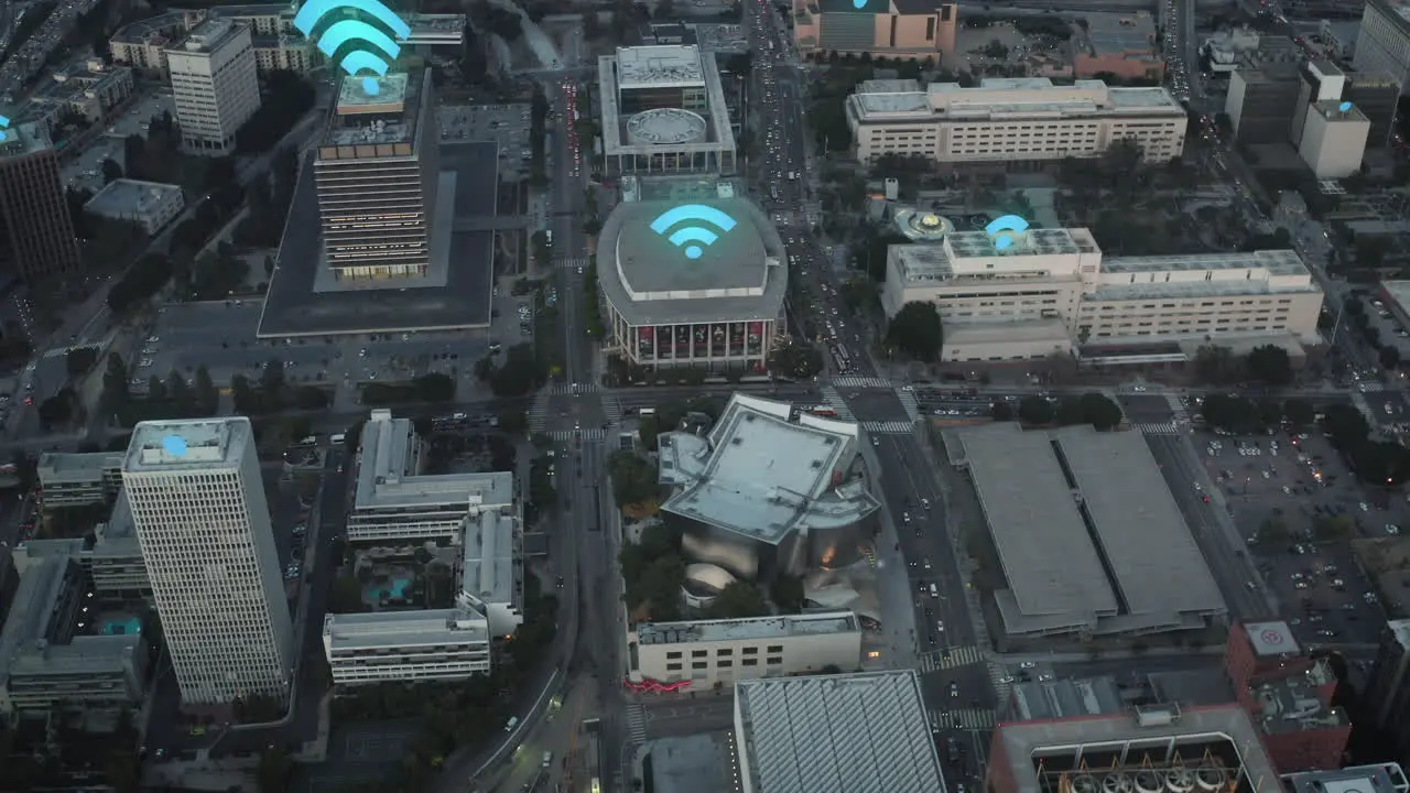 Forwards fly above urban borough after sunset Animated Wifi symbol showing available access points Los Angeles USA