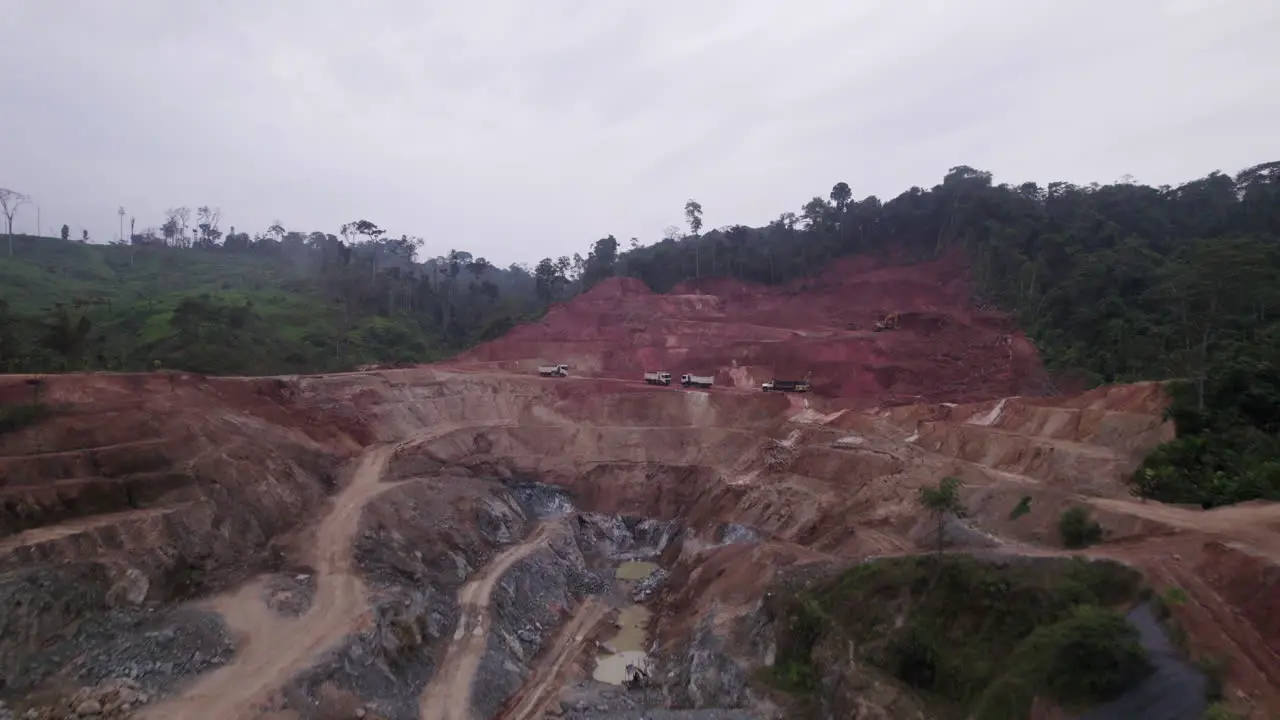 A drone shot drifting through a small sustainable gold mine in the rainforest