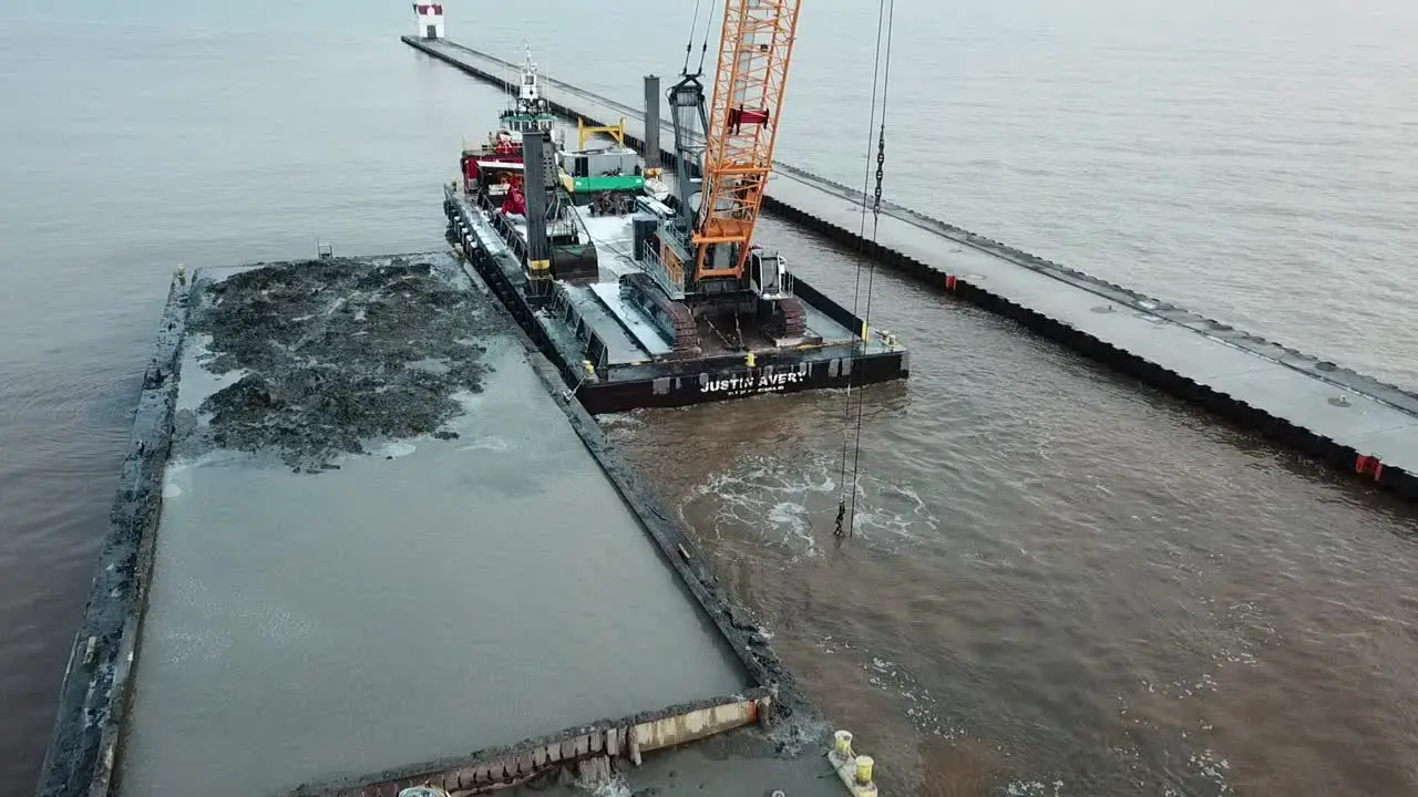 Dredging operation in Kewaunee Harbor on Lake Michigan Kewaunee Wisconsin-8