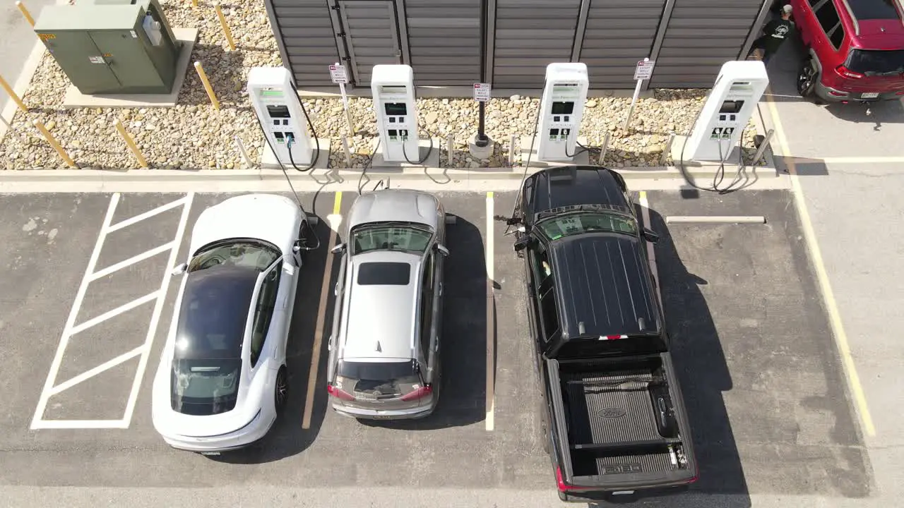 DC fast charging station for electric vehicles aerial top down view