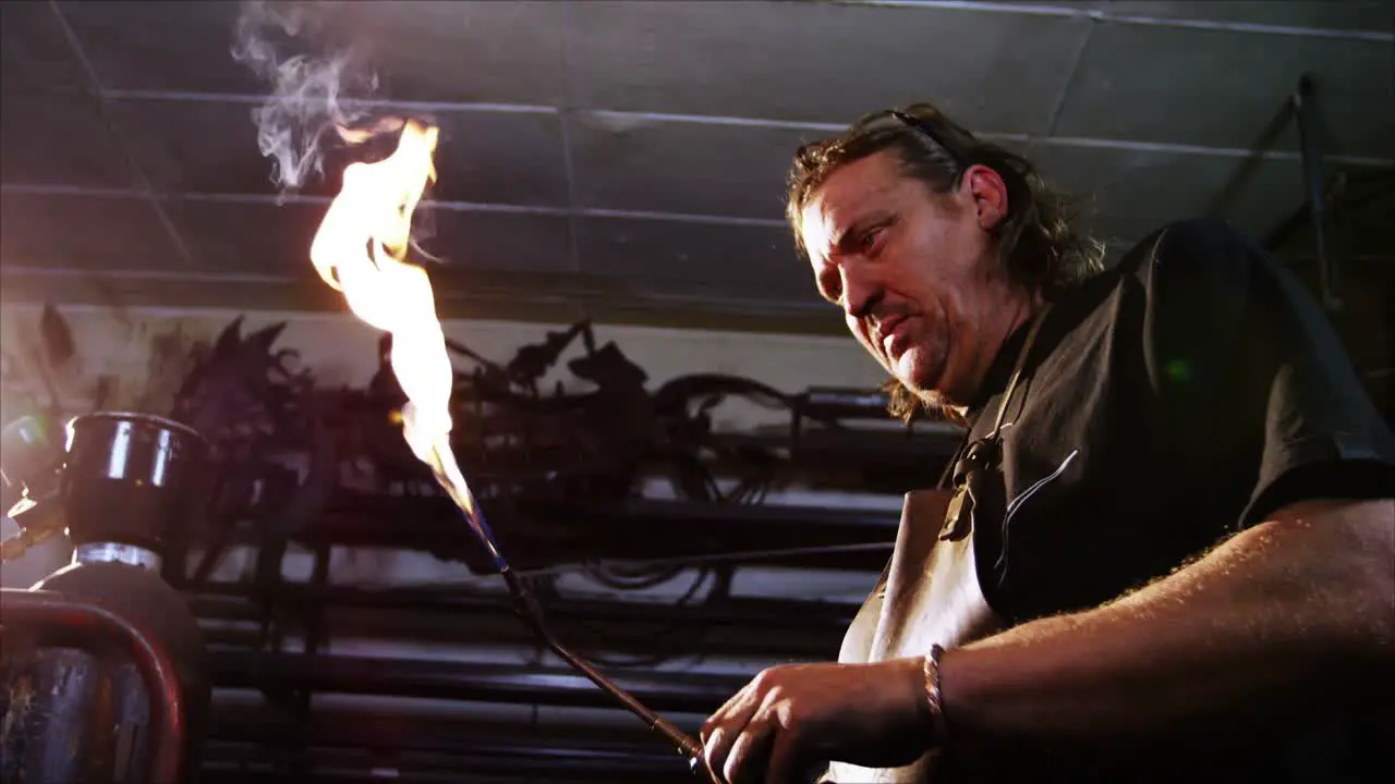 Welder burning welding torch