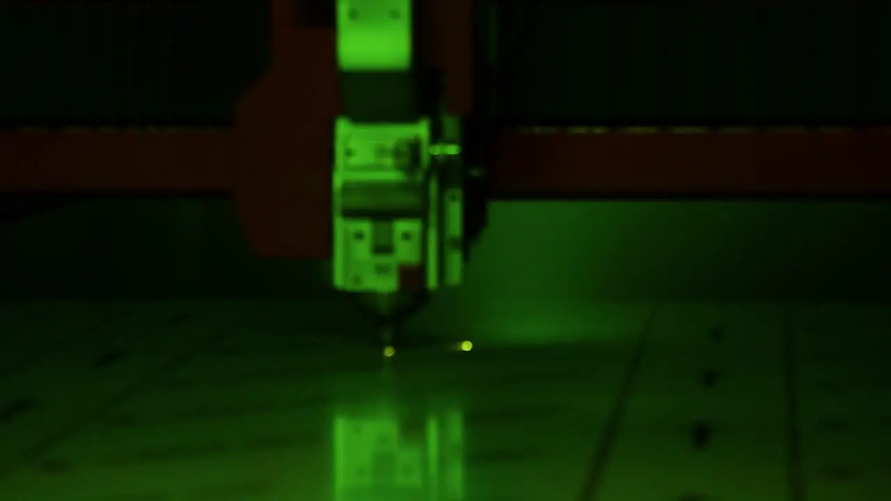 Cinematic shot of worker welding metal in a factory