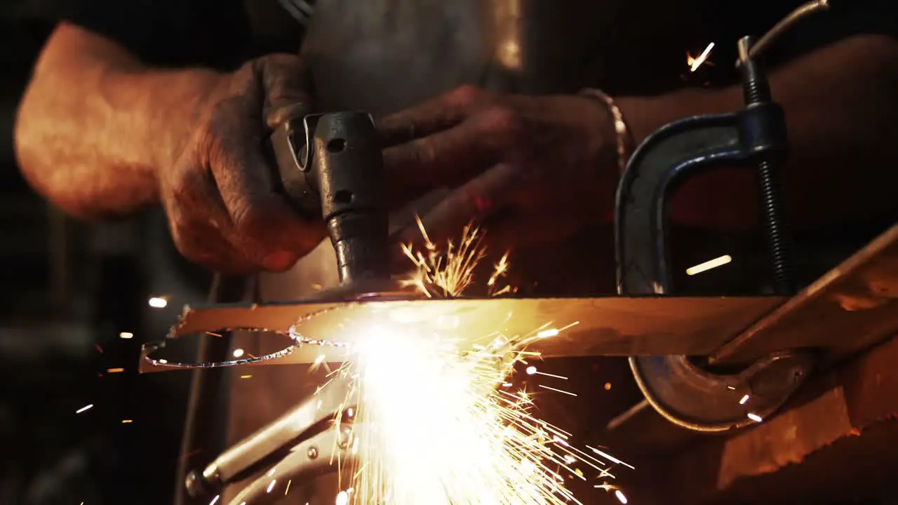 Mid-section of welder using welding torch