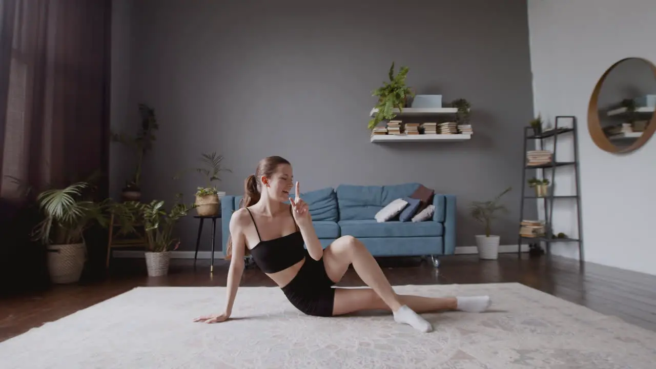 Wide Shot Of A Cute And Young Female Vlogger Teaching An Online Fitness Class