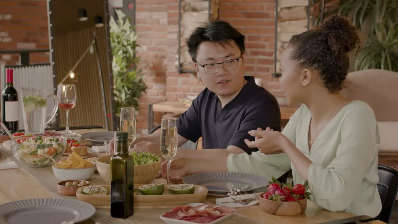 An Young Man And A Pretty Girl Chatting On A Date