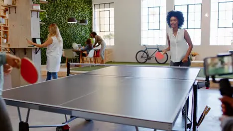 Table tennis phone and video with a woman