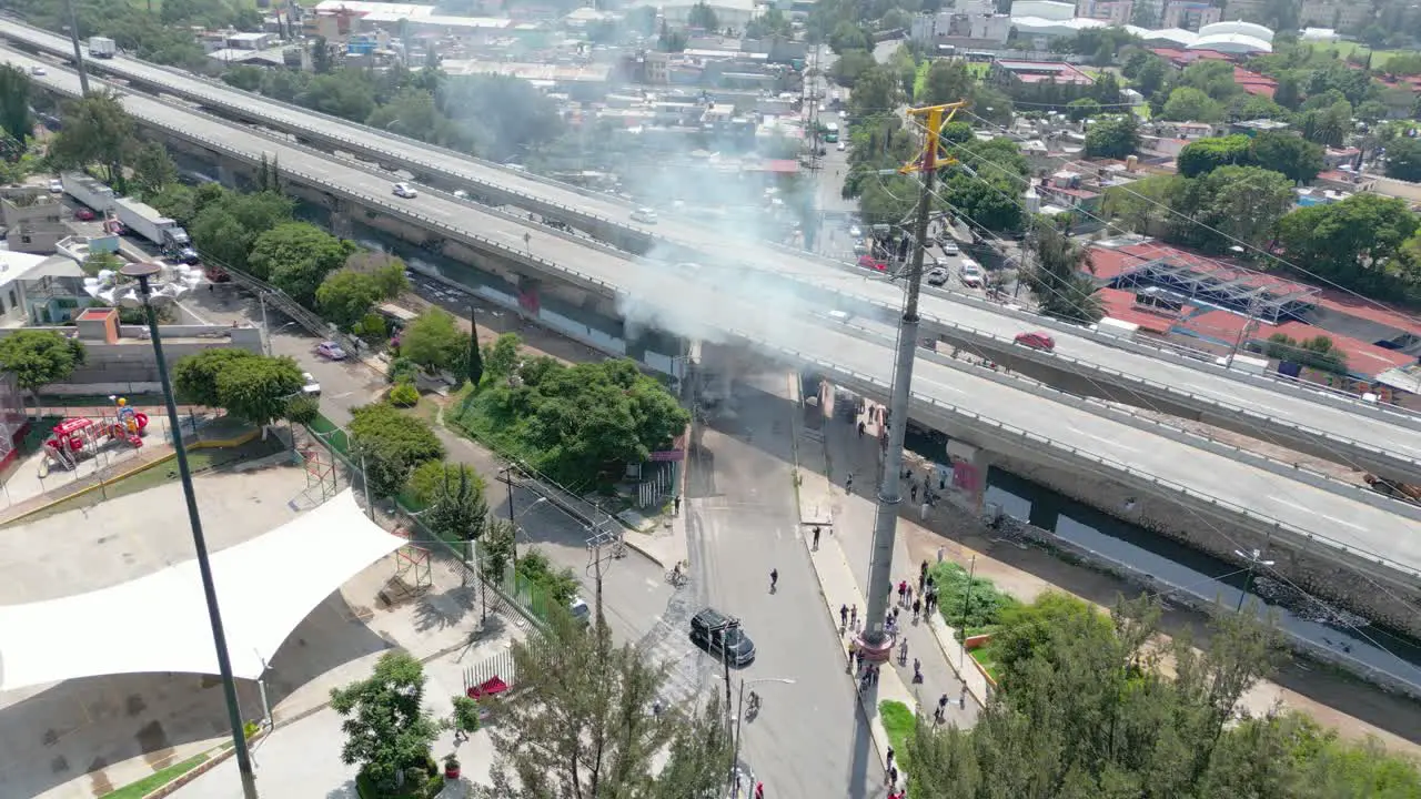 Aerial Clip Flying fire under bridge