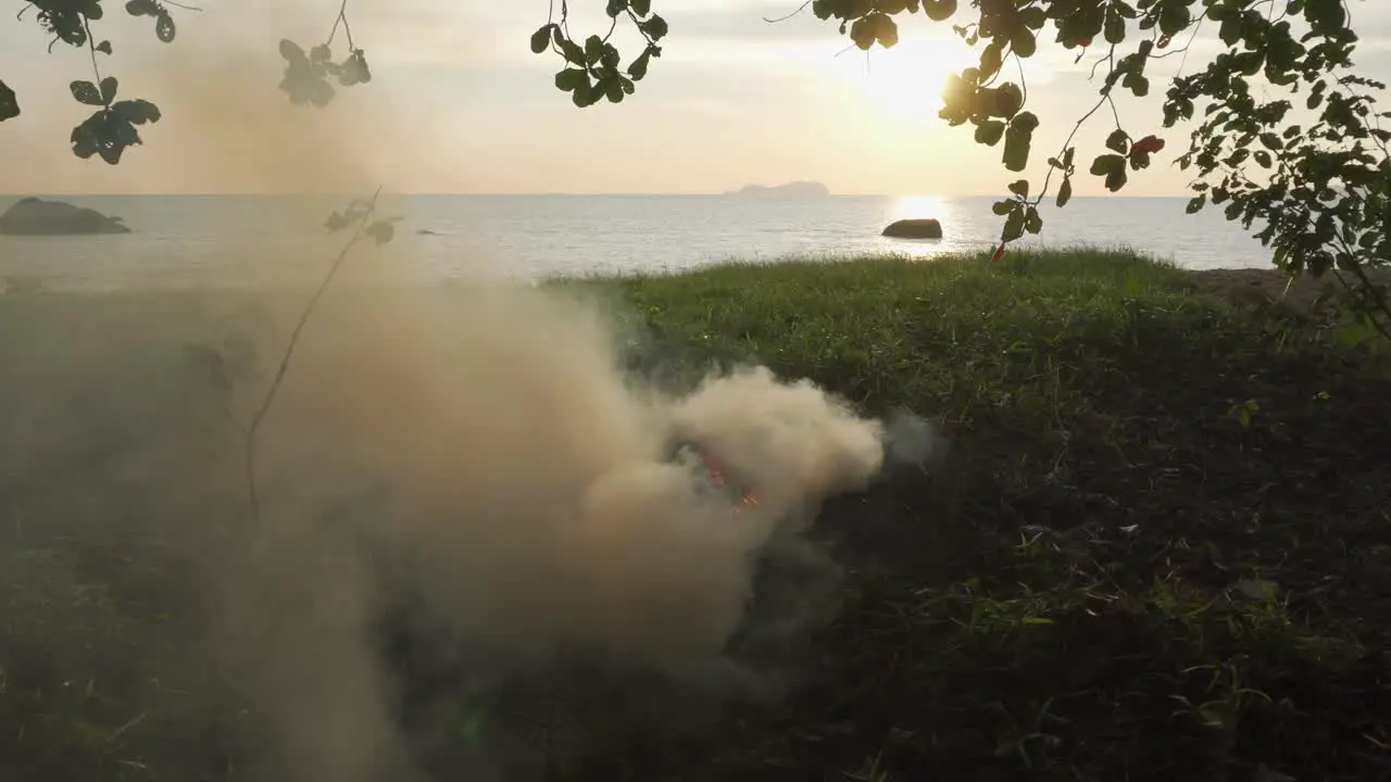 Burning of the garbage at grass area