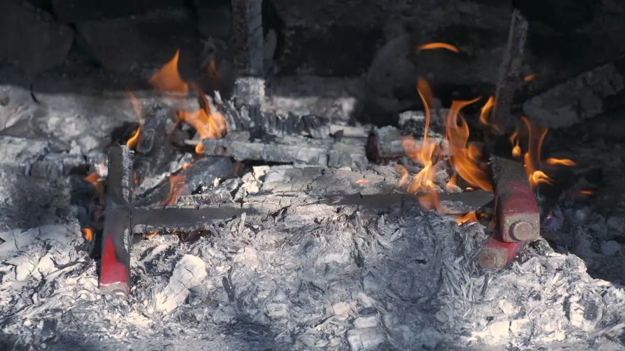 Fire flame in empty barbecue bbq grill at slow motion