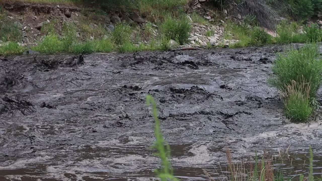 Burn scar and mud slide into the river near Glen Haven Colorado July 15 2022