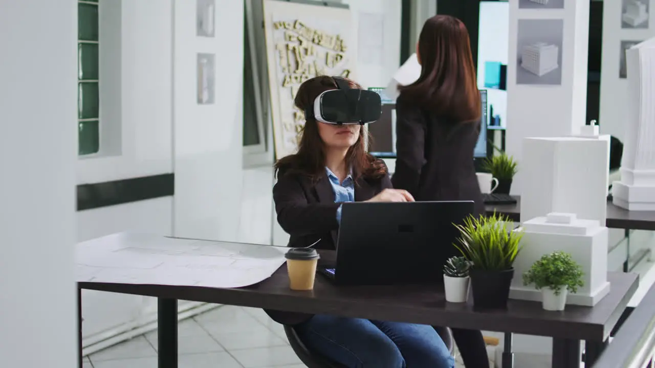 Woman architect working with vr glasses in startup office