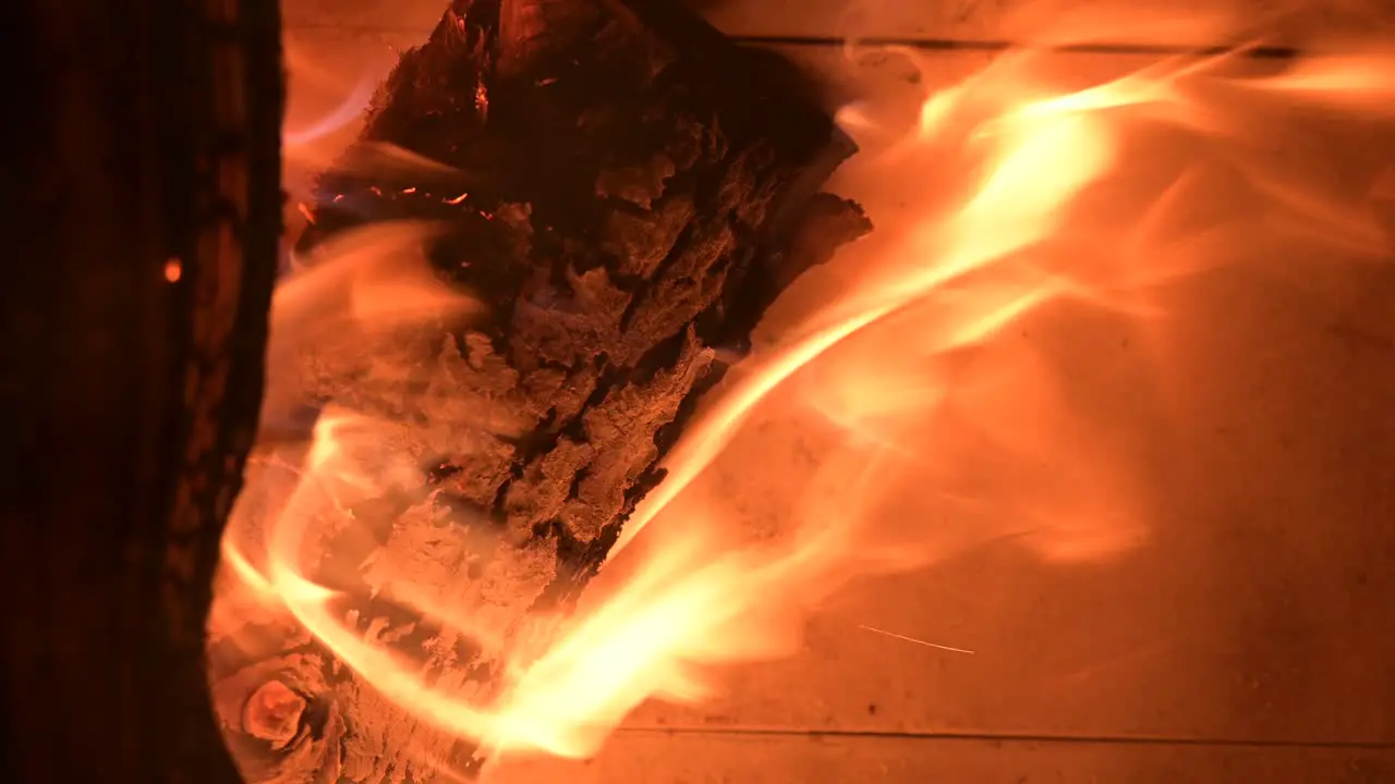 VERTICAL fire flame close up of wood burning