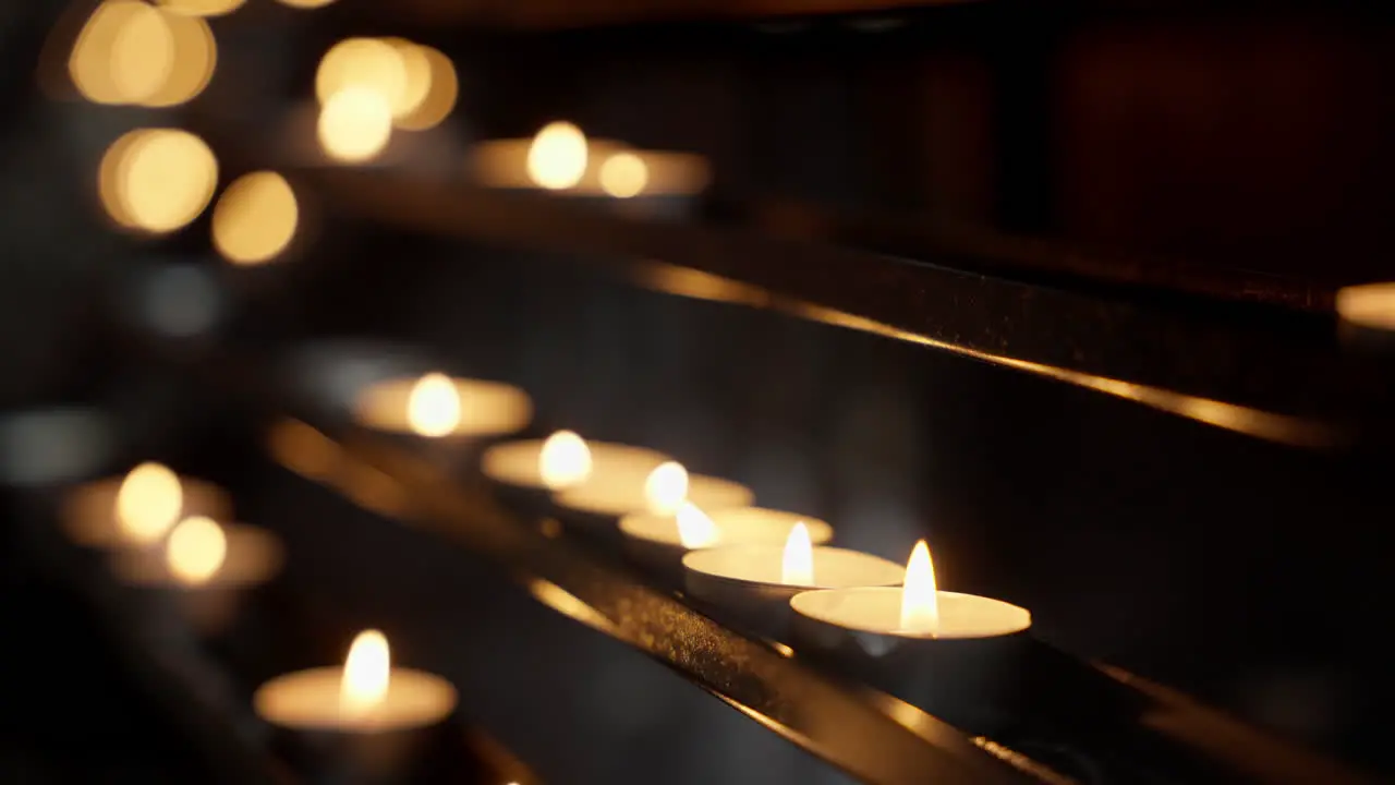 Close-up shot of burning candle over the wood