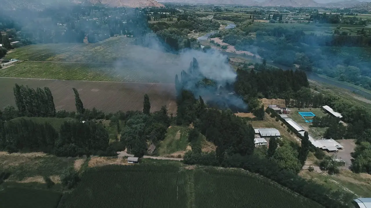 flying over a farm on fire in Chile