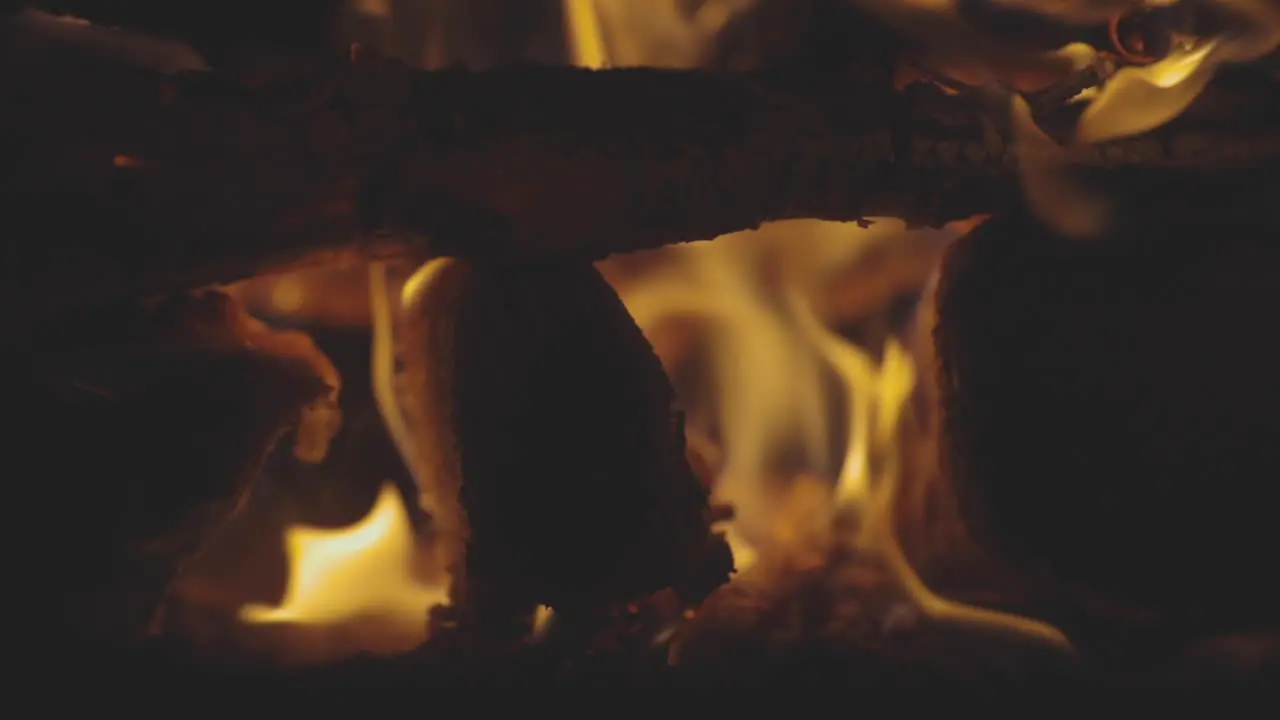 Macro shot of logs burning in a fire pit