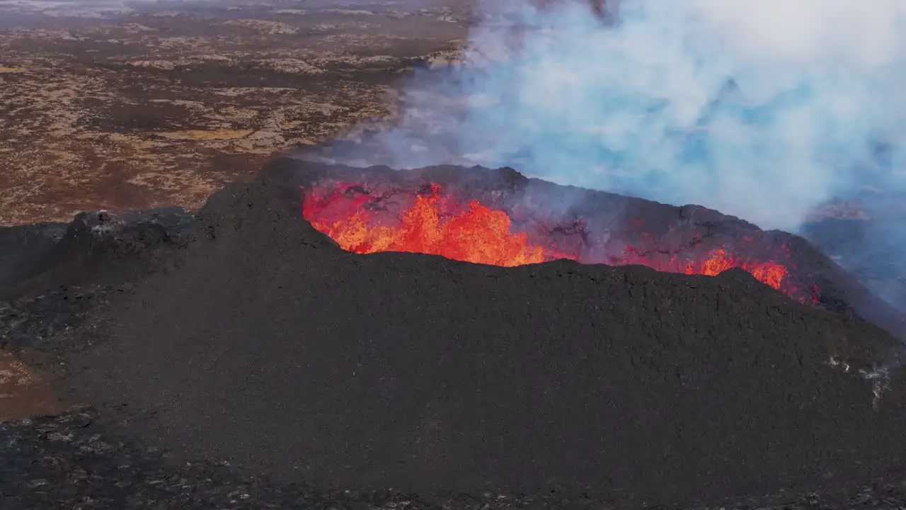 Aerial shot of new Iceland volcano erupting during daylight