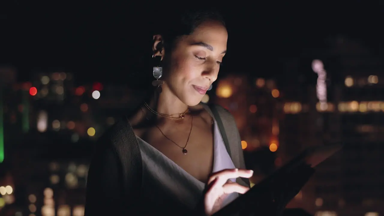 Woman digital tablet and rooftop at night in city