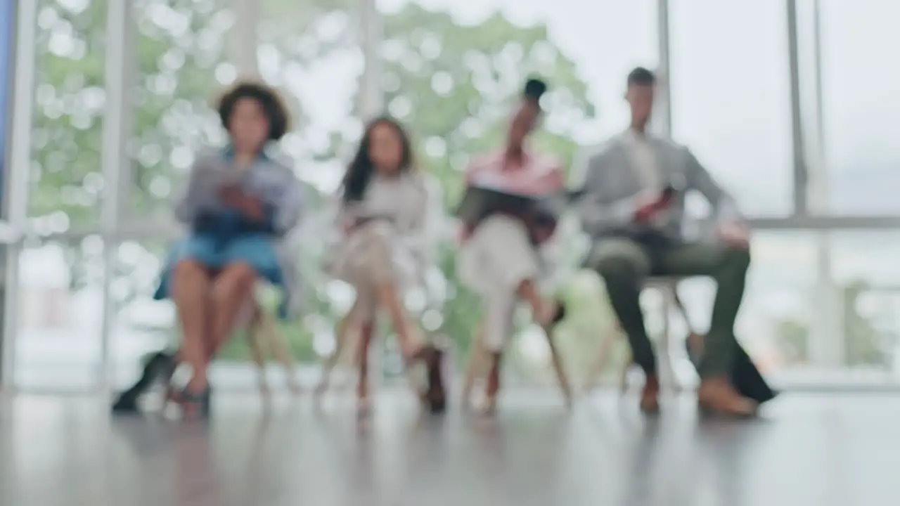 Business people row and sitting in waiting room