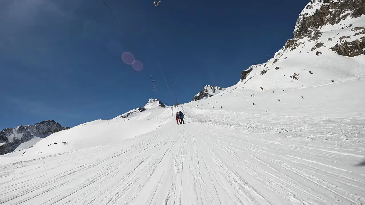 POV Skier On Ski Drag Chair Lift Austria Solden Skiing