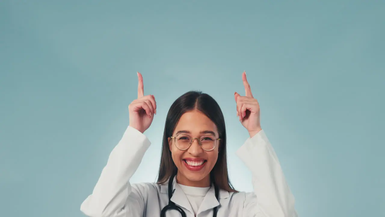 Portrait studio and woman in healthcare pointing