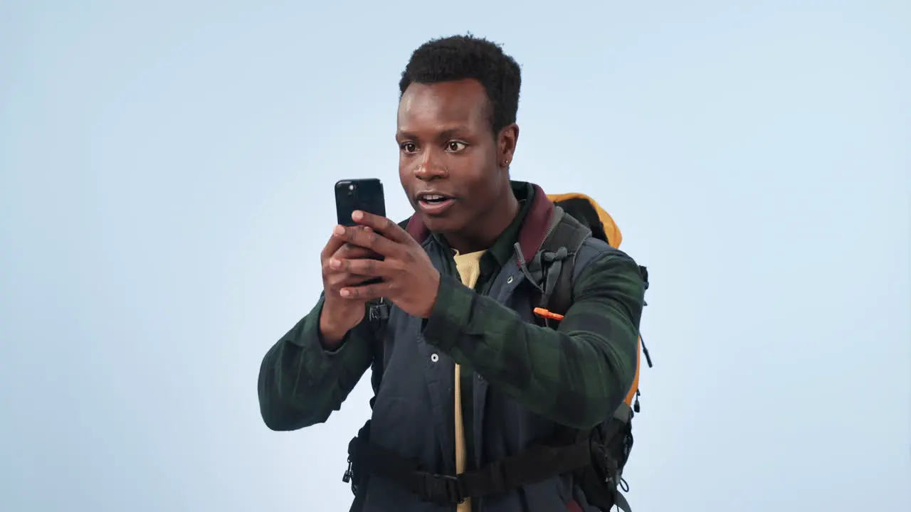 Black man travel and happy with phone