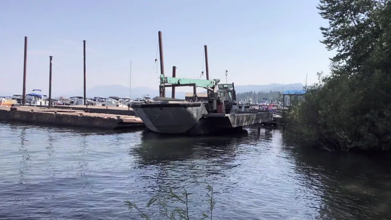 A utility boat parked near a Lake Tahoe marina