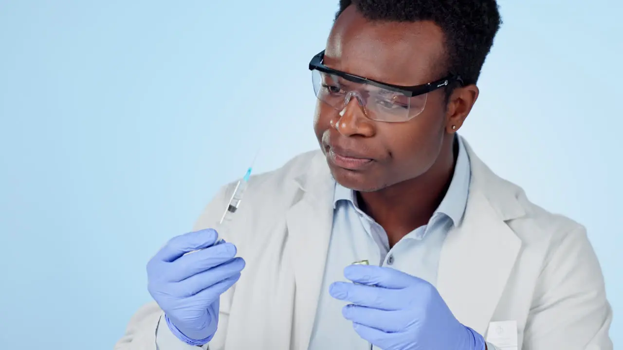 Science man and needle in studio for vaccine