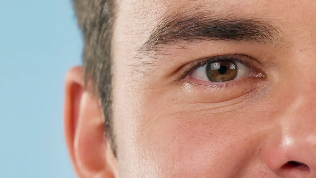 Closeup vision and eye of a man on a blue