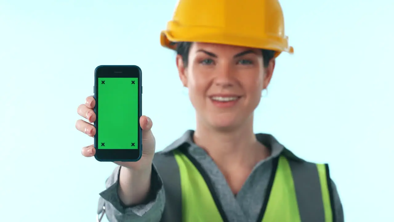 Studio happy woman or engineer with phone green