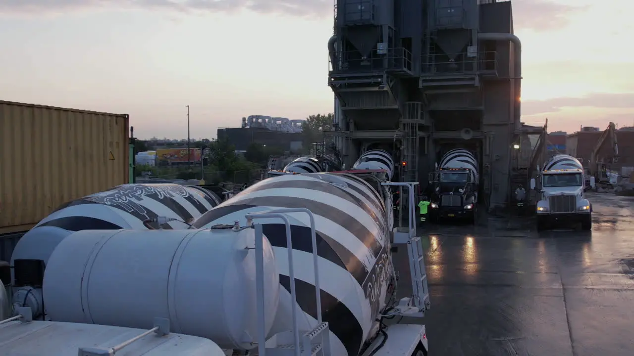 Heavy Mixer Concrete Trucks at Loading Station in Ready Mix Plant Brooklyn NYC USA