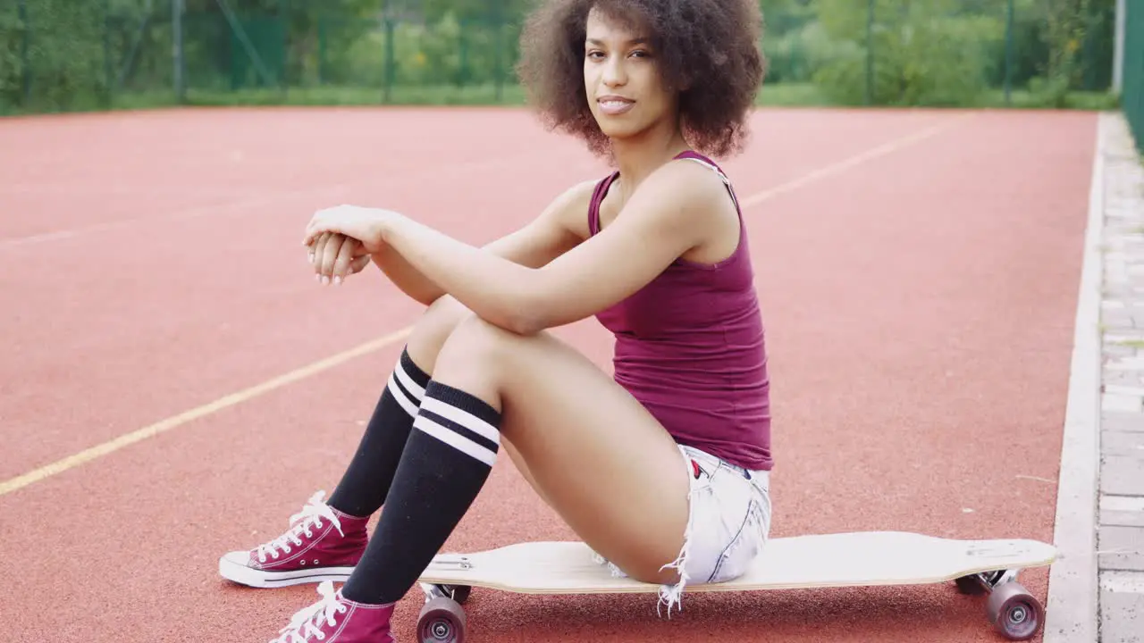 Charming model on sports ground