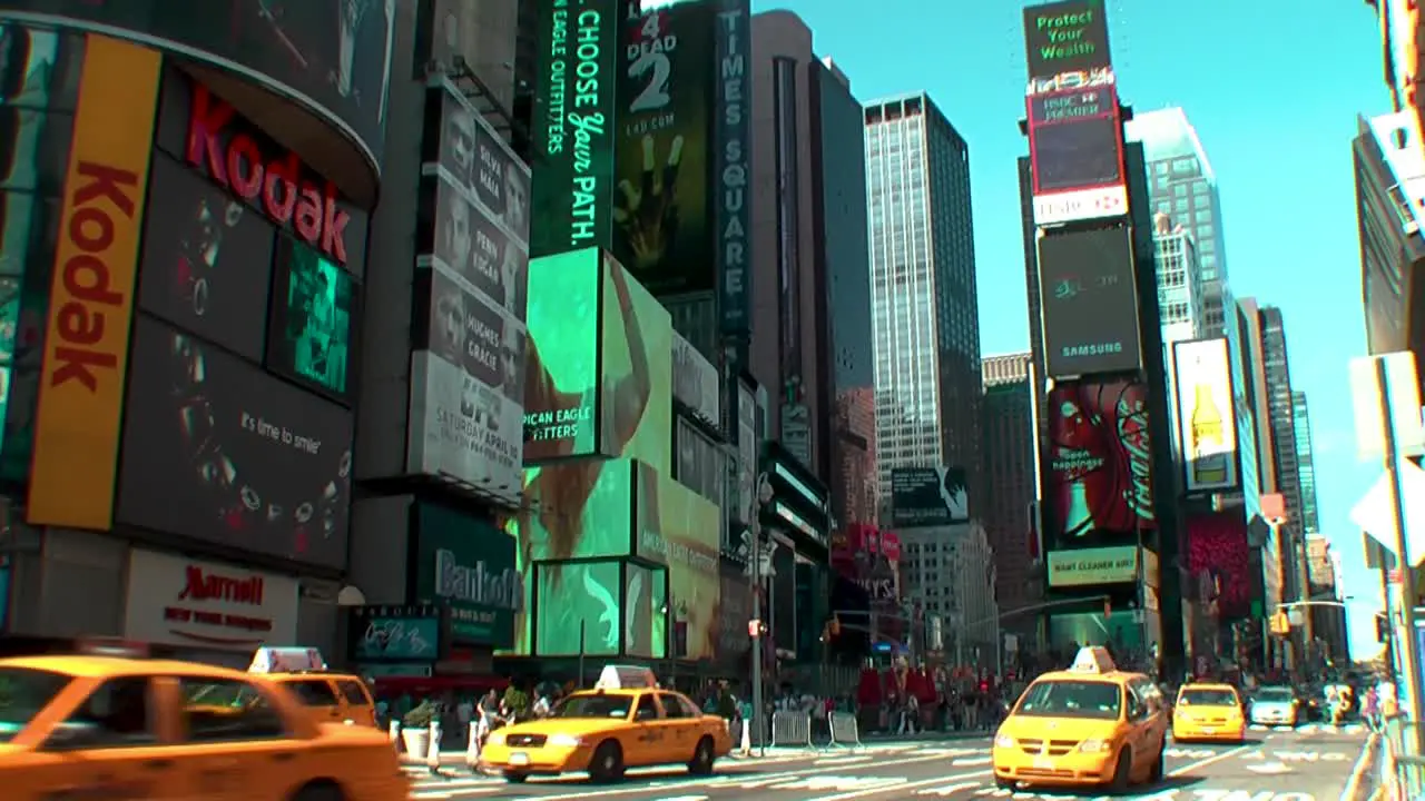 Handheld establishing shot of Times Square in 2010