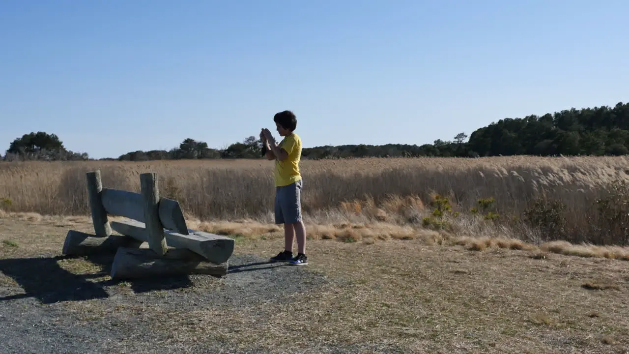 Virginia Chincoteague Boy Takes Photograph