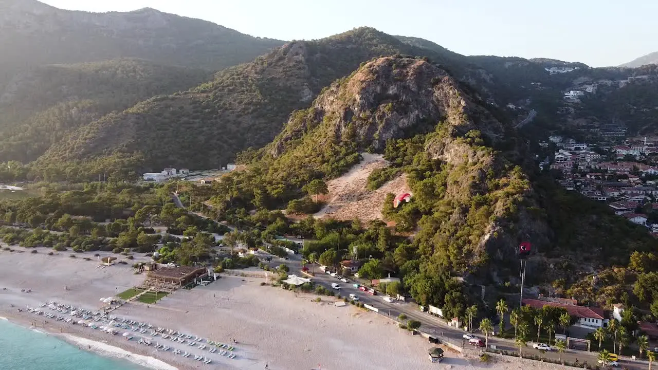 Paragliding and boats at paradisiacal beach in Turkey