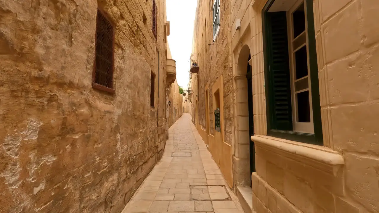 Steadily walking through the tight streets of Valletta Malta