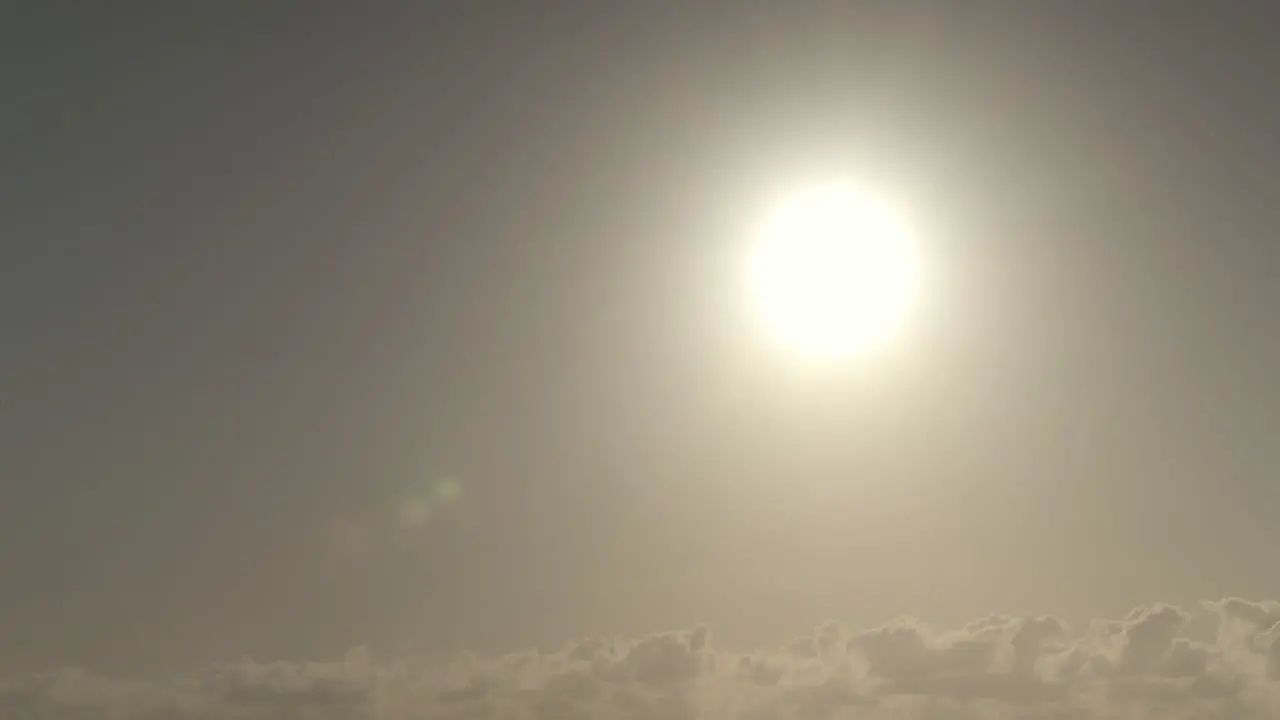 Plane flight against the sunlight